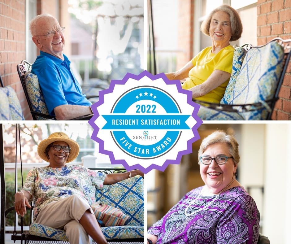 Cheerful residents enjoying a vibrant community setting, celebrating their five-star resident satisfaction award.