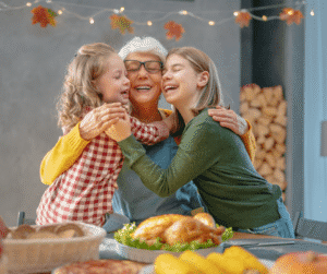 11-1-23 - Grace Management Grandmother cooking holiday meal with her granddaughters