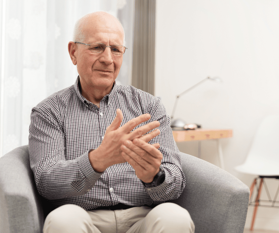 Senior man with Arthritis holding hand in pain