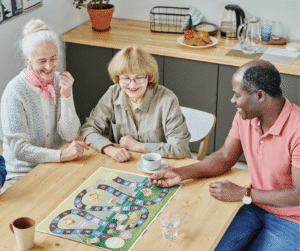 12-18-24 - Grace Management Older adults playing a board game