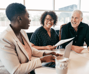 Group of three people having a meeting.