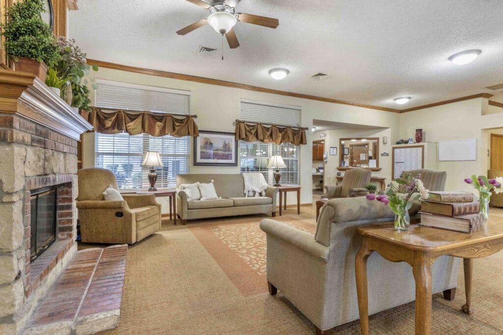 Inviting common area featuring comfortable seating, elegant decor, and natural light, perfect for socializing and relaxation.