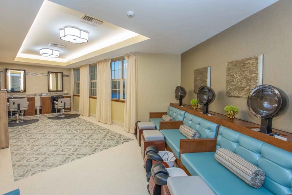 Sage-Desert-Tucson-AZ-2018-June-0567-2048x1365 - Grace Management Sophisticated salon area with modern styling stations and comfortable seating, exuding an atmosphere of relaxation and care.