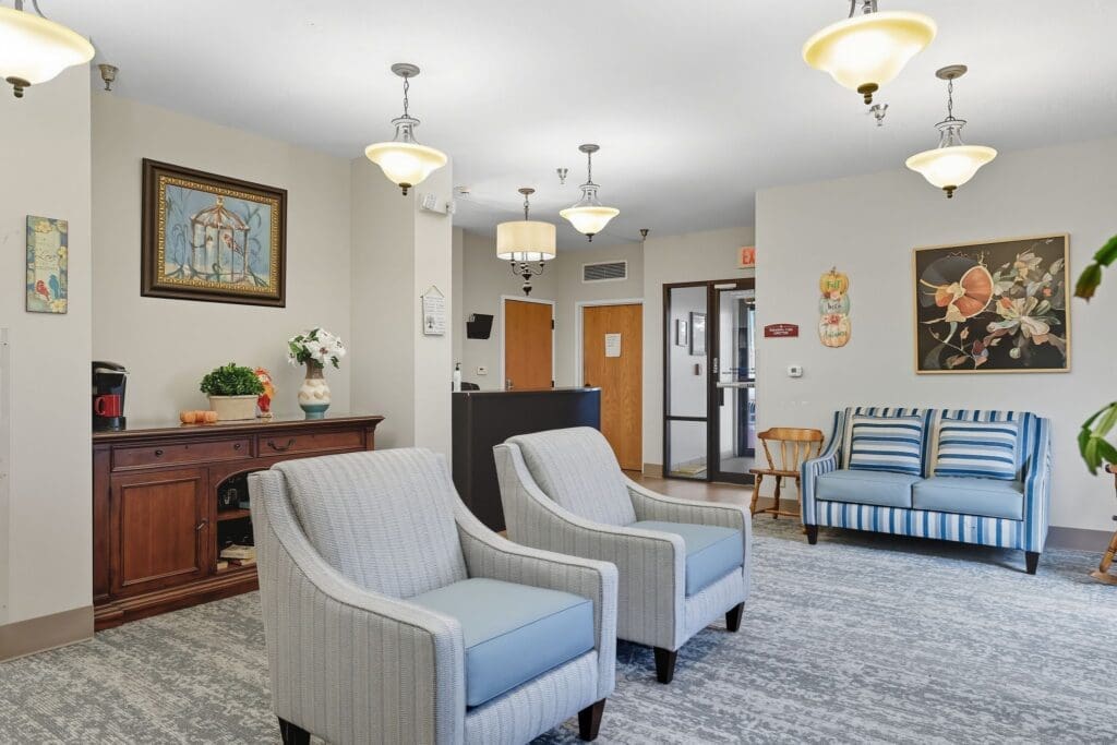 Inviting lounge area featuring stylish seating, warm lighting, and cheerful decor, perfect for relaxation and socialization.