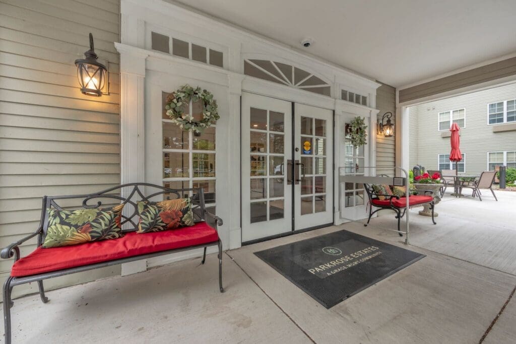 Welcoming entryway featuring comfortable seating, vibrant decor, and a charming atmosphere for residents and visitors.