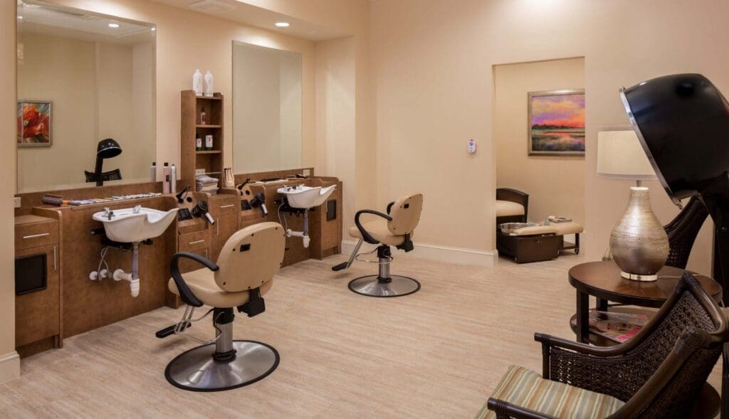 Elegant salon space with modern styling chairs, wash stations, and a cozy seating area for a vibrant lifestyle.