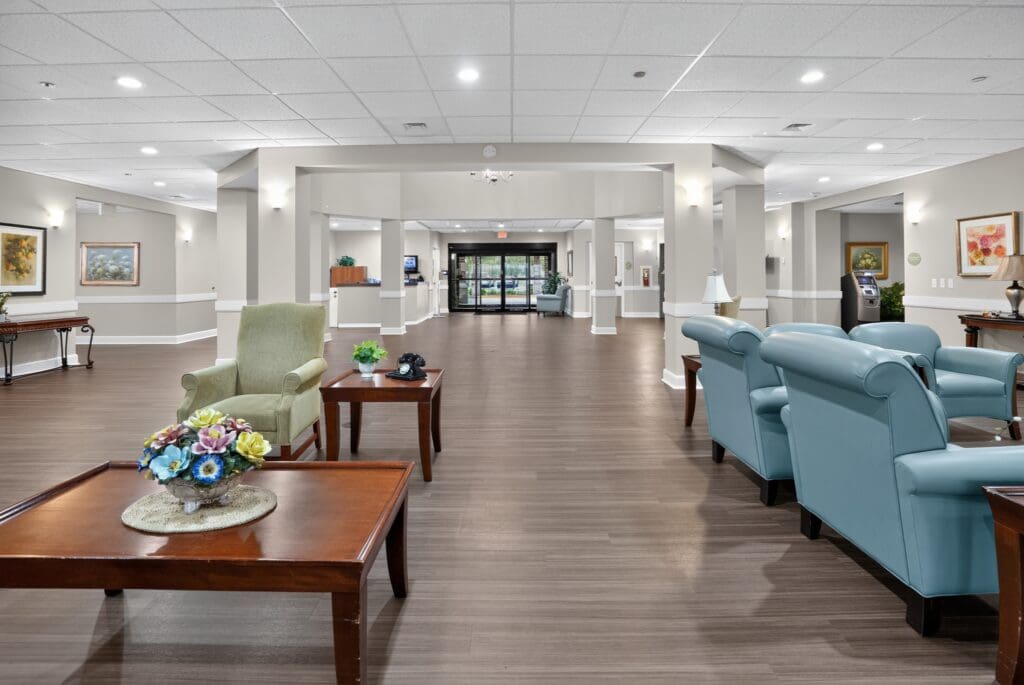 Inviting communal space featuring elegant seating, wooden tables, and bright decor, promoting a vibrant lifestyle.