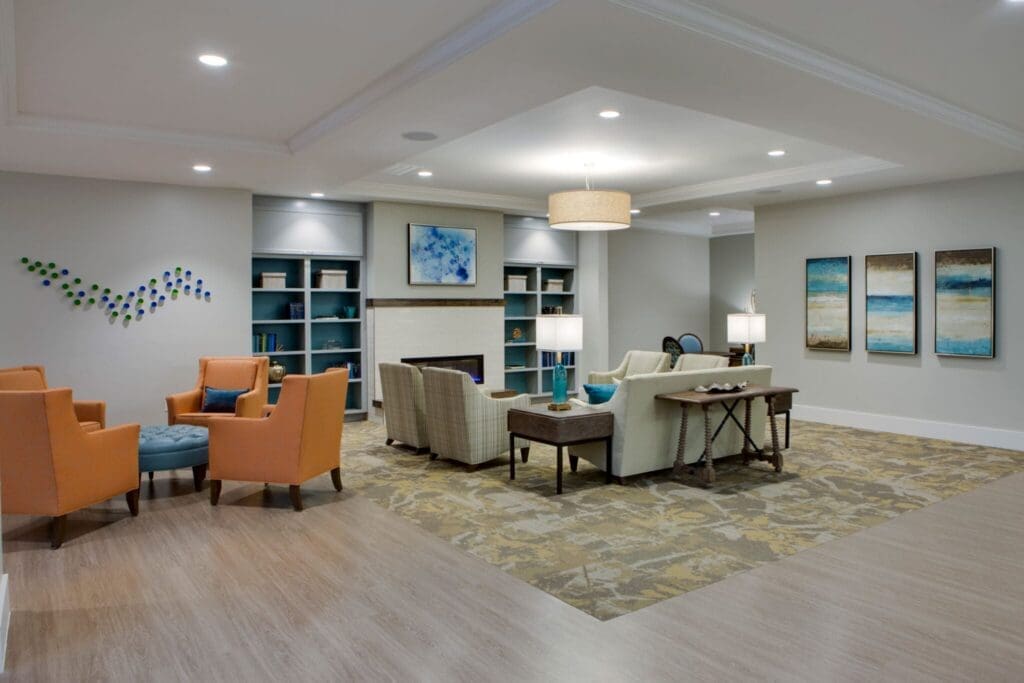 Heritage-Oaks1840-2048x1366 - Grace Management Welcoming lounge area featuring comfortable seating, elegant decor, and warm lighting, promoting relaxation and community.