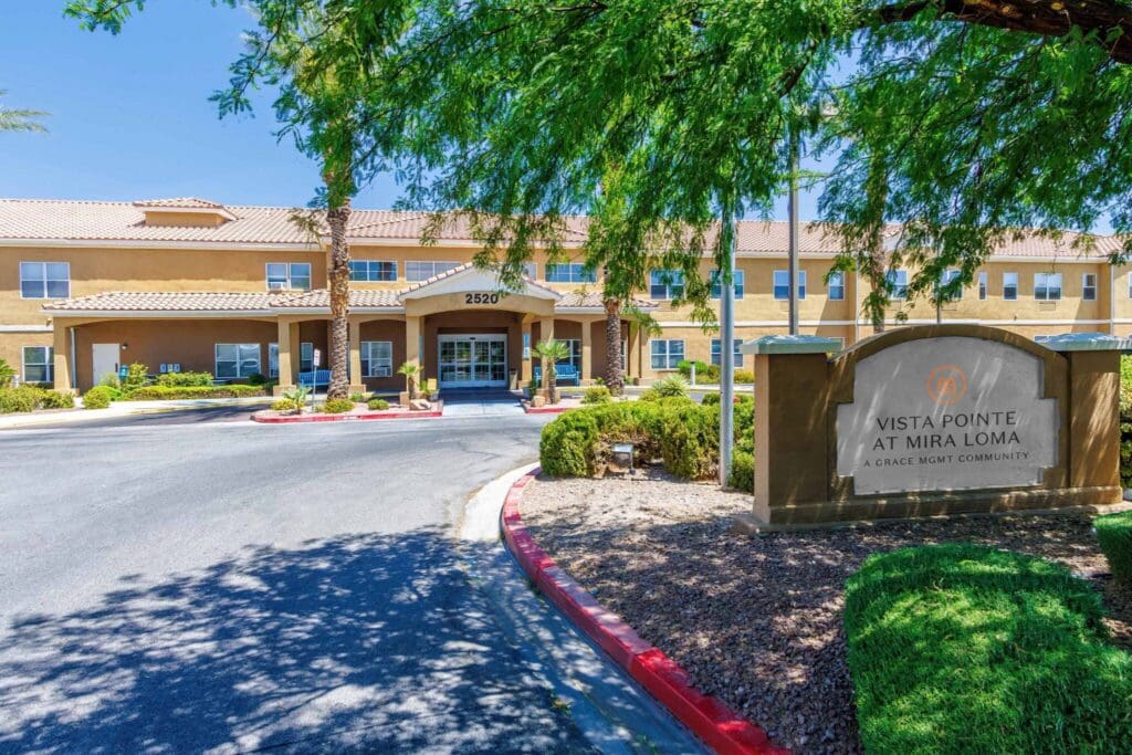 Elegant entrance of Vista Pointe at Mira Loma, showcasing upscale amenities and a vibrant community atmosphere.