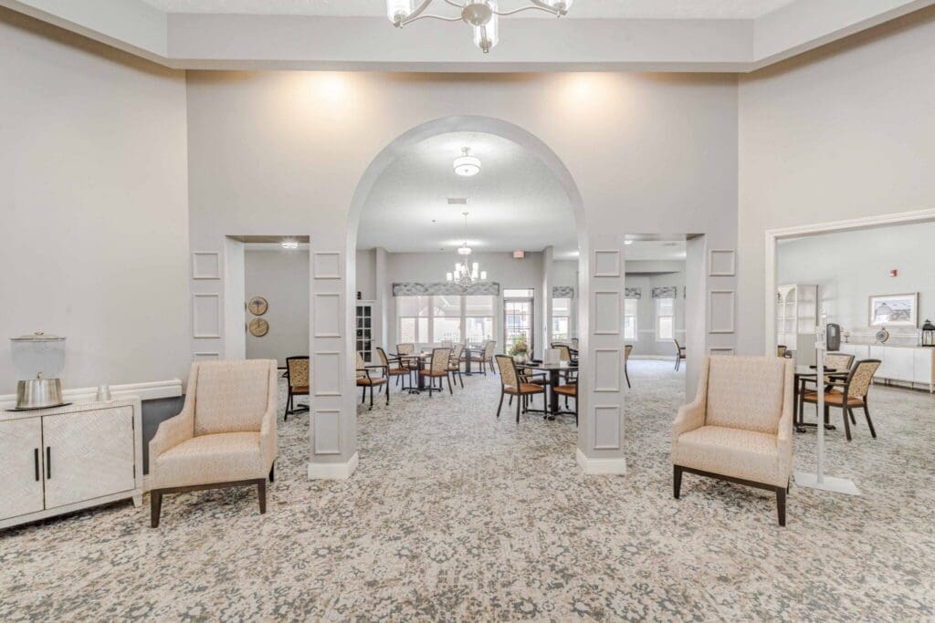 Elegant common area featuring stylish seating, vibrant decor, and inviting dining spaces, promoting a warm community atmosphere.