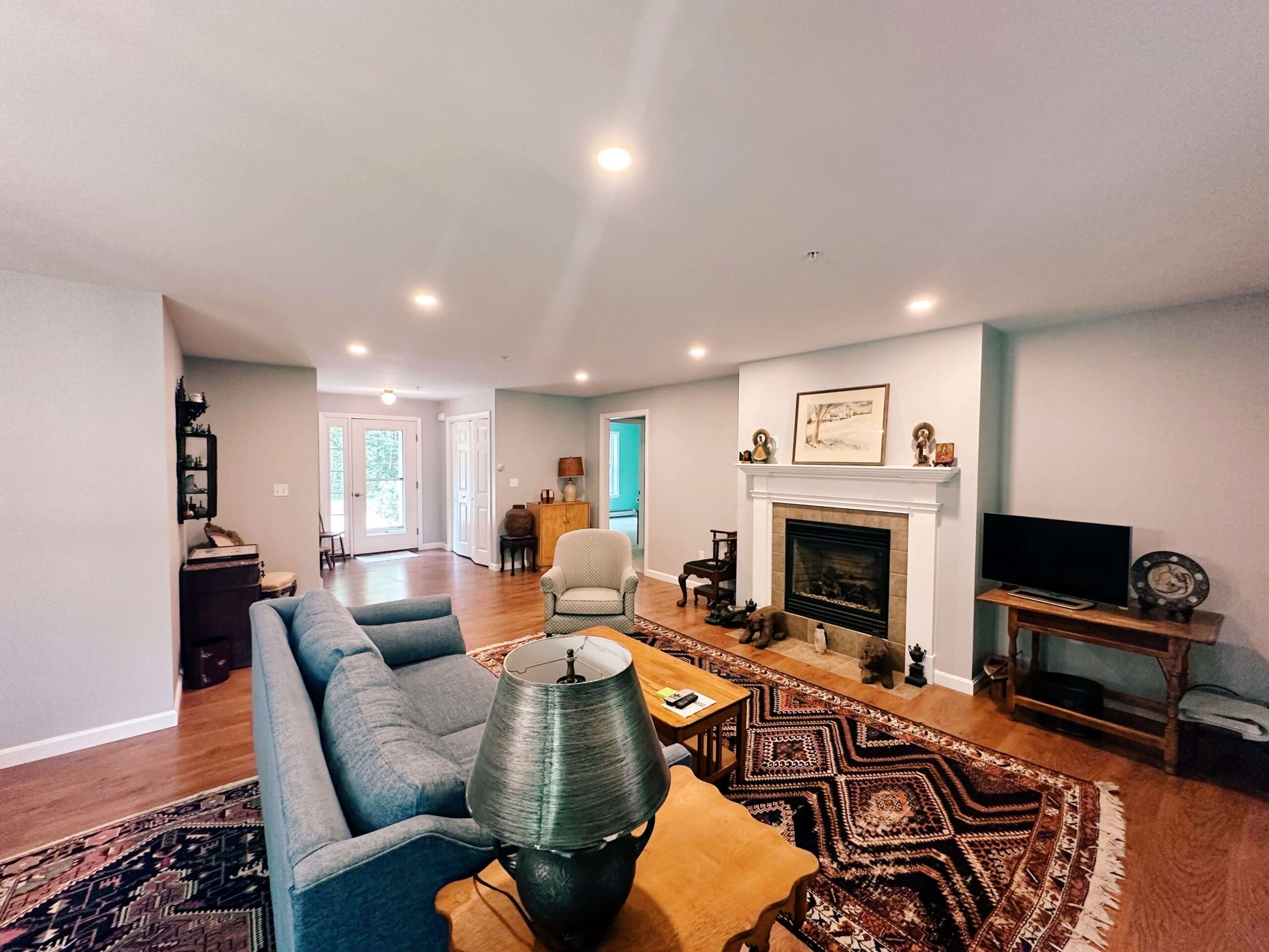 - Grace Management Resident living room at The Highlands, a reliable assisted living option near Brunswick, Maine.