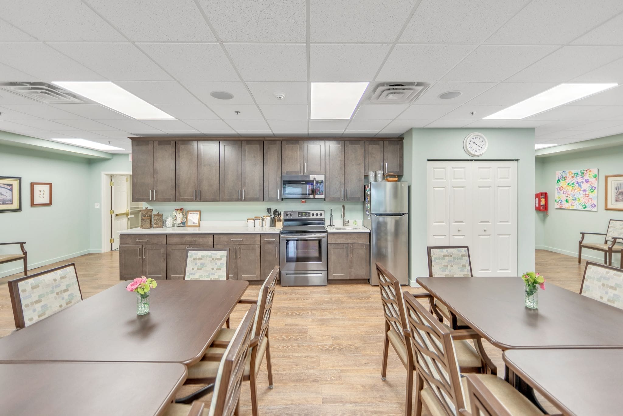 - Grace Management Common kitchen area at Parkrose Estates, a provider of luxury independent senior living near Syracuse, NY.