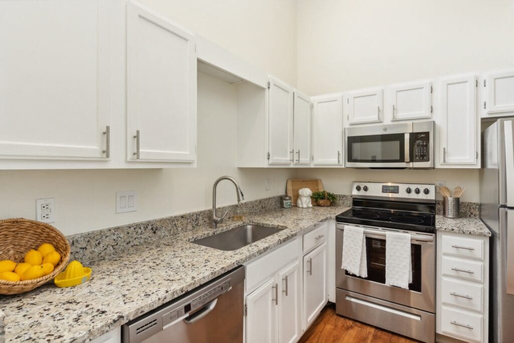 Interior image of an apartment kitchen at The Country Club of La Cholla.