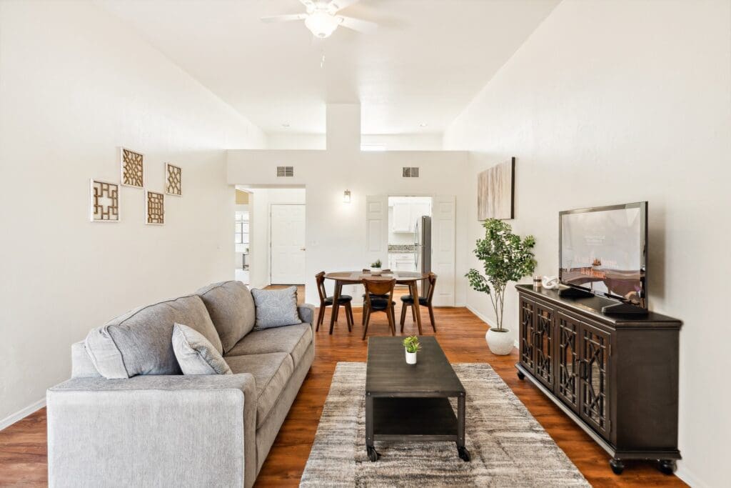 Interior image of an apartment living room at The Country Club of La Cholla.