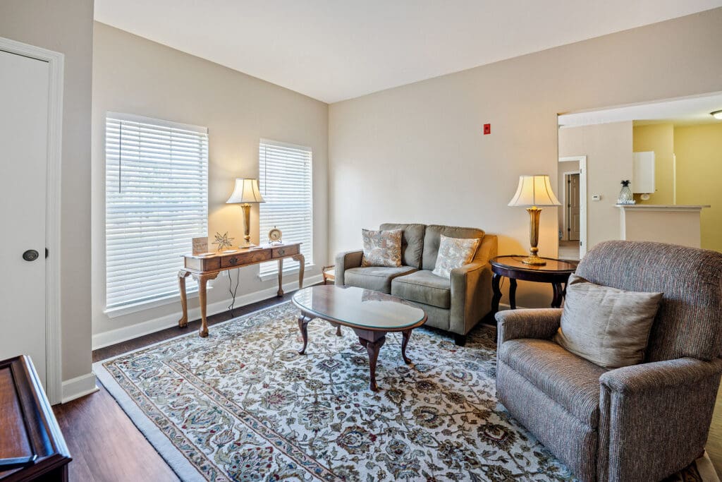 - Grace Management Interior image of a resident's apartment living room at Town Village Audubon Park.