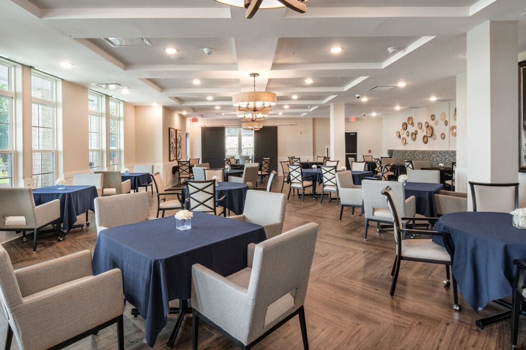 - Grace Management Spacious dining room at The Summit of Germantown, providing a welcoming environment for residents at this Germantown senior living community.
