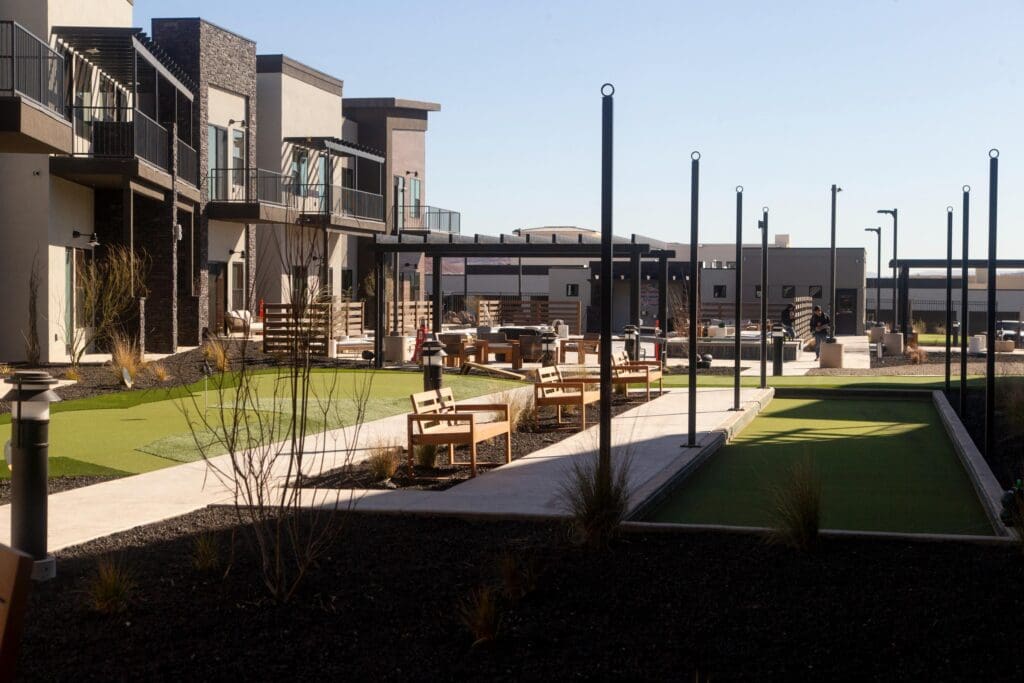 - Grace Management Patio seating area at Snow Canyon Retirement Community, highlighting the beautiful accommodations of retirement living near St. George.