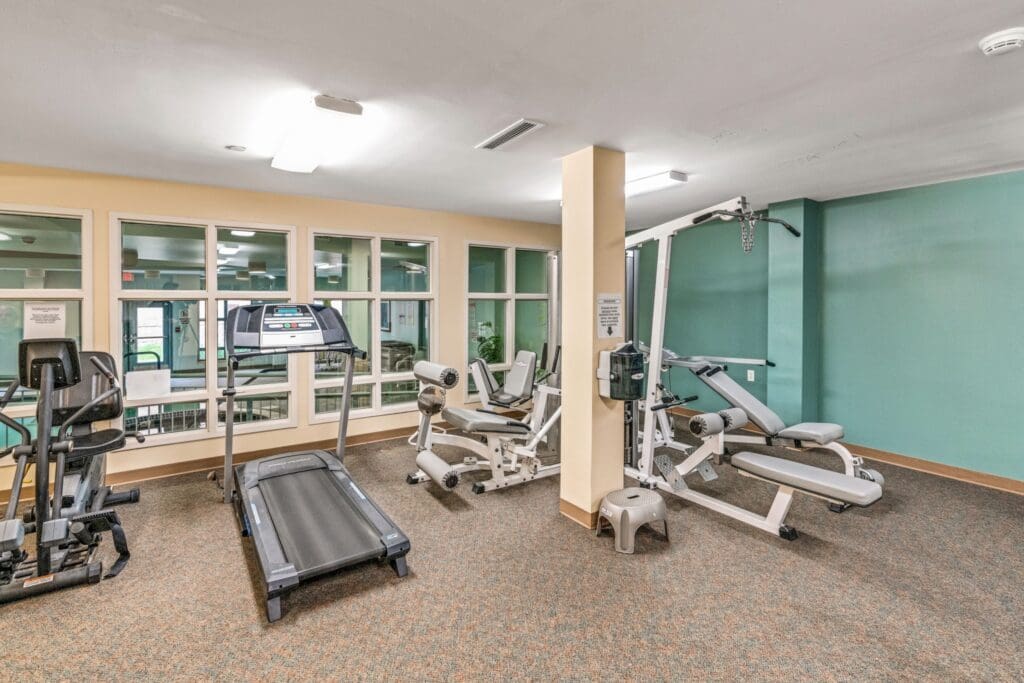 - Grace Management The gym is equipped with cardio and strength training machines at Town Village Sterling Heights, a senior living community near Clinton Township, MI.