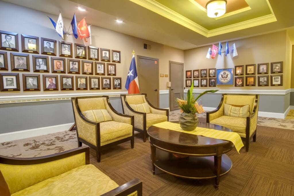 - Grace Management Interior image of the Wall of Honor at The Landon at Lake Highlands, a senior living community in Lakewood, TX.