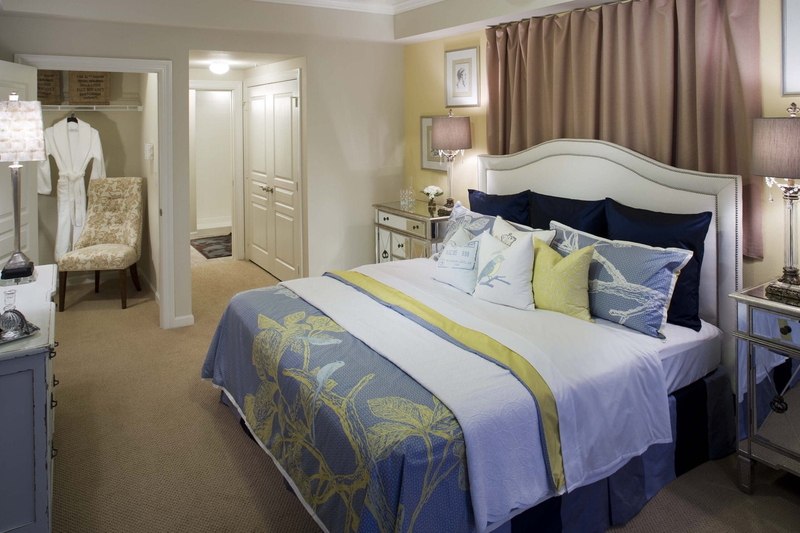 - Grace Management Interior image of a resident's bedroom at The Landon at Lake Highlands, a senior living community in Lakewood, TX.