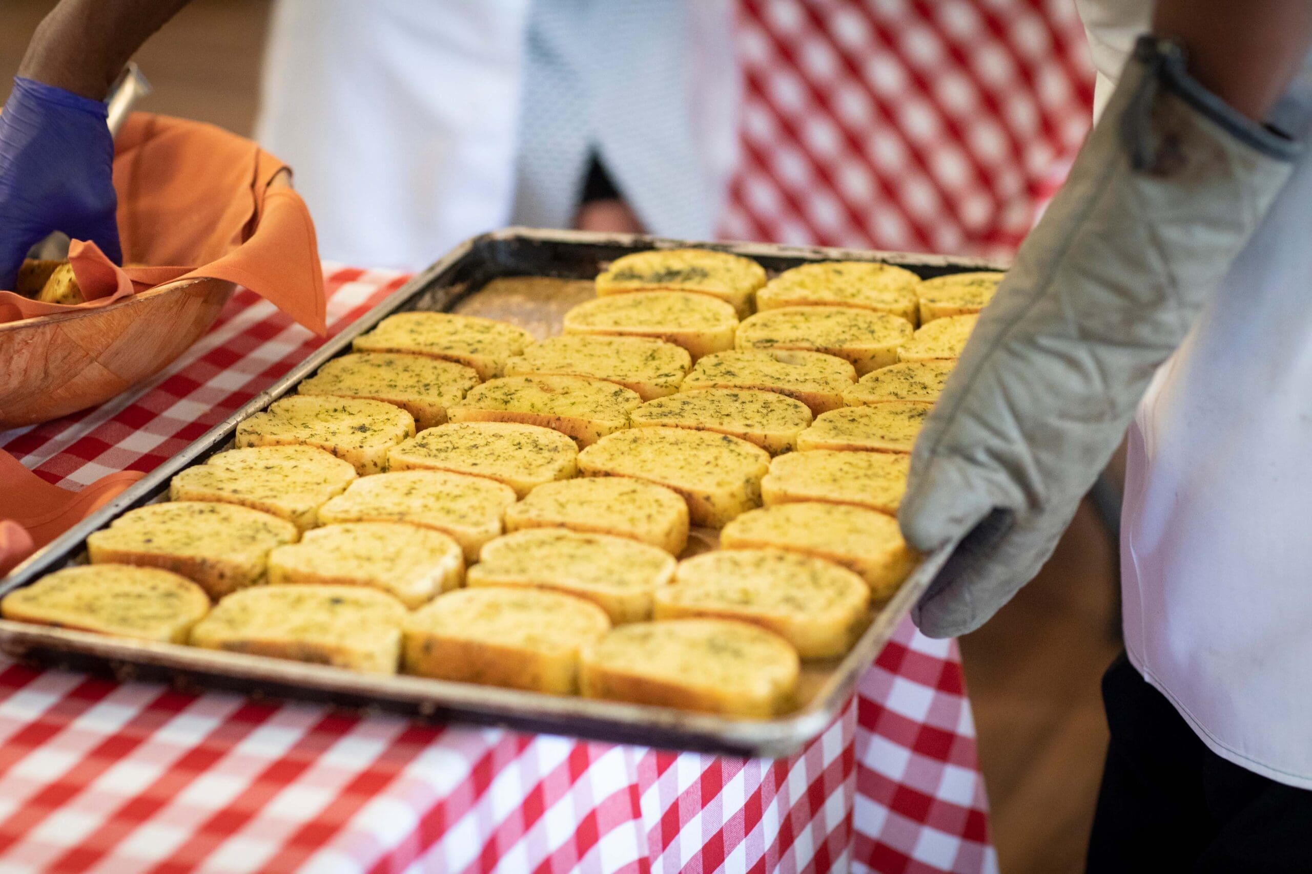 - Grace Management A pan of garlic bread sits on a red and white gingham table cloth at Point Pleasant, a trusted option for independent living near Monroeville, PA.
