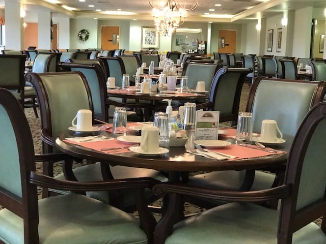 - Grace Management Interior image of a the Point Pleasant dining room at Point Pleasant, a senior living community near Pittsburgh.