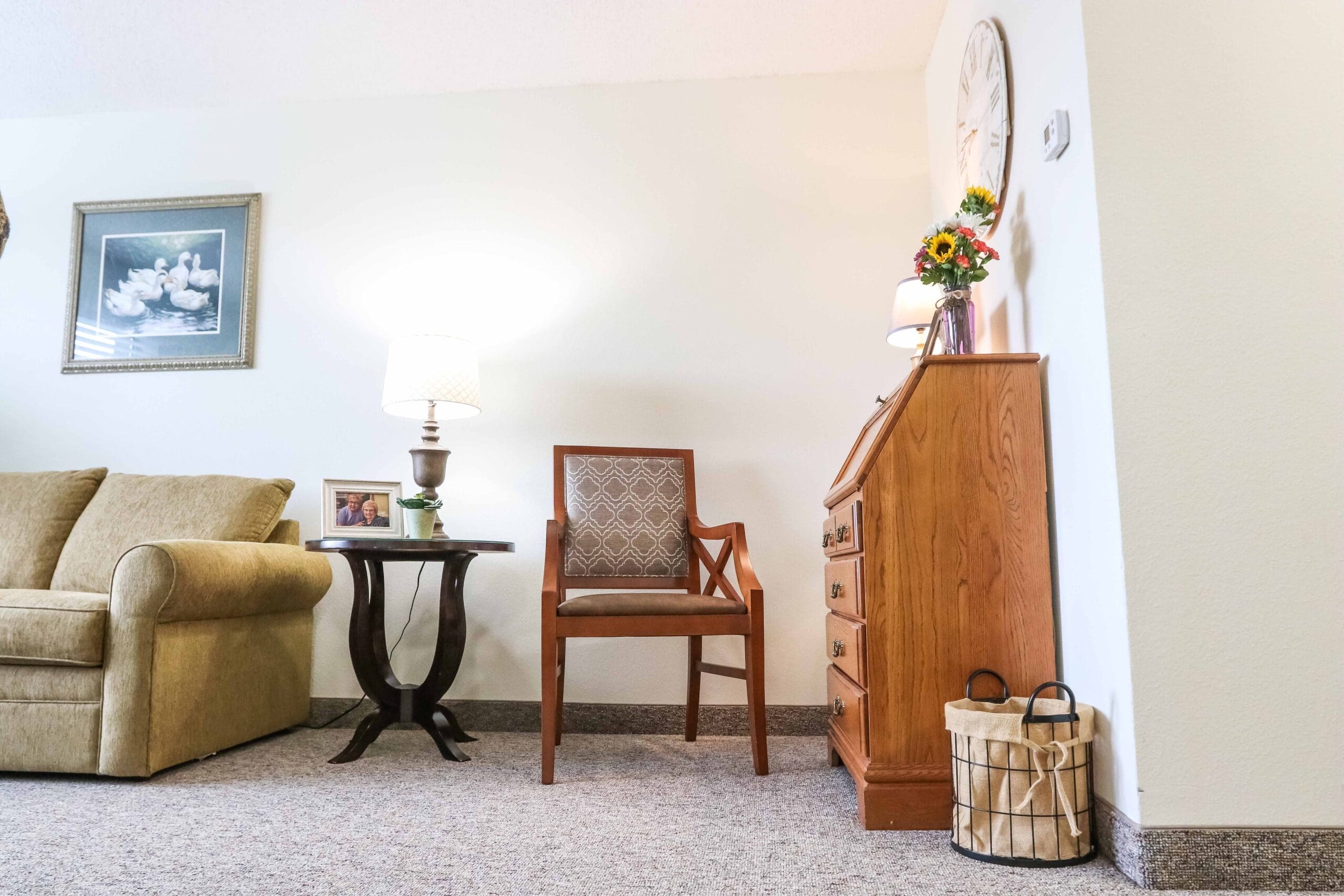 - Grace Management Interior image of a resident's apartment living room at Sedgwick Plaza.