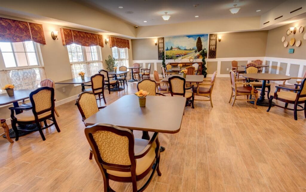 - Grace Management Dining room at Palm Bay Memory Care, a community offering senior living near Melbourne.