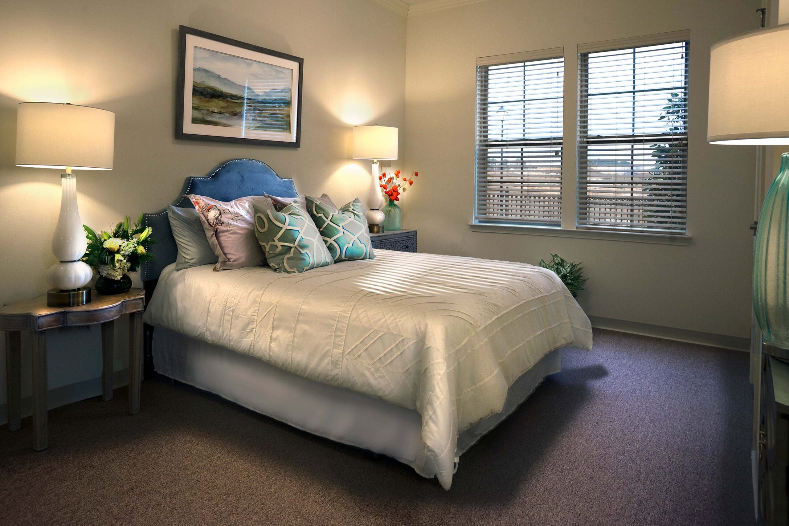 A furnished bedroom at The Magnolia at Oxford Commons, a senior living community in Tupelo, offering assisted living, and memory care.