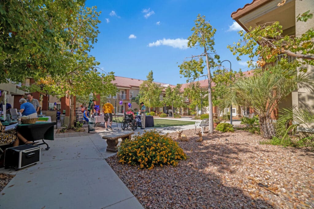 Outdoor courtyard and garden at Acacia Springs, a premium senior living community.