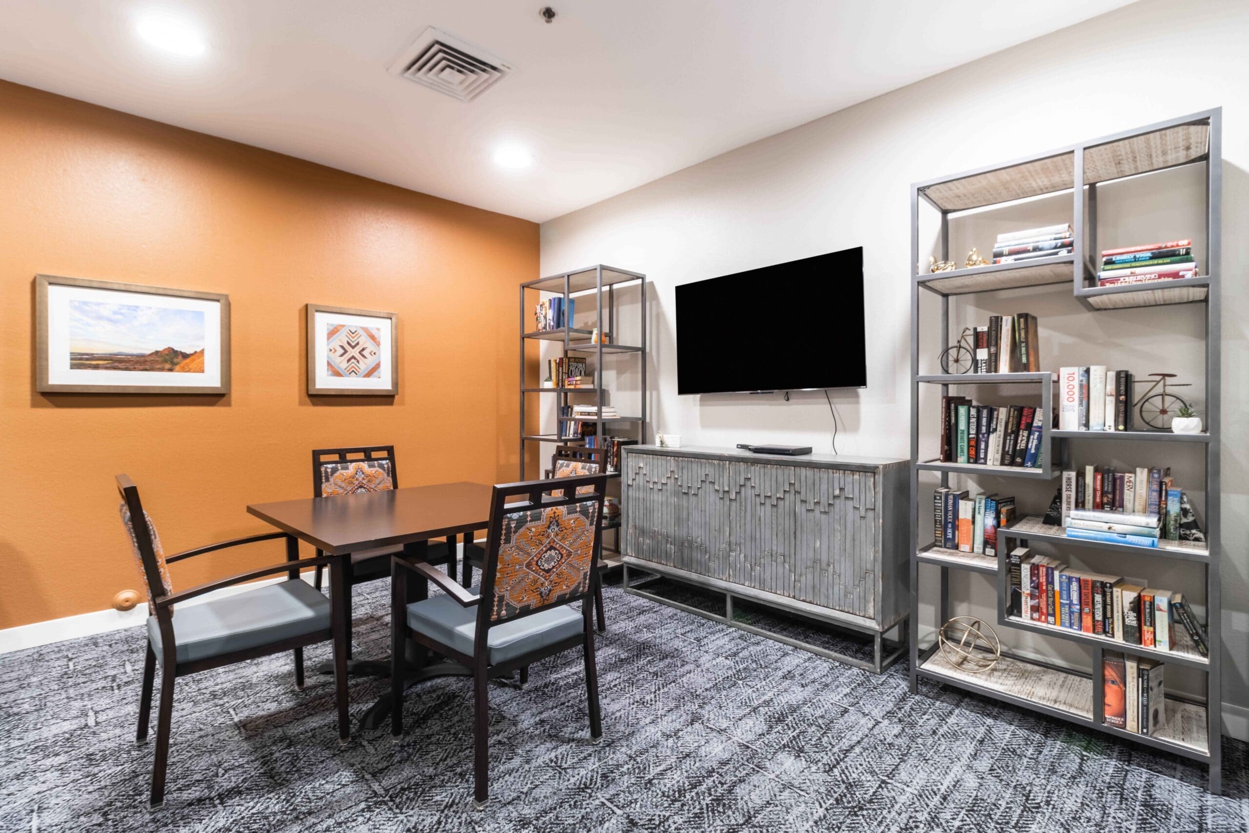 Interior photograph of the Inspirations of Tempe social area / media room.