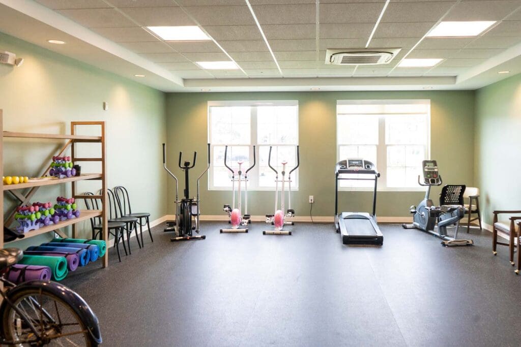 - Grace Management A well-equipped fitness center for residents to stay active at The Arbors at Gulf Breeze, a senior living community.