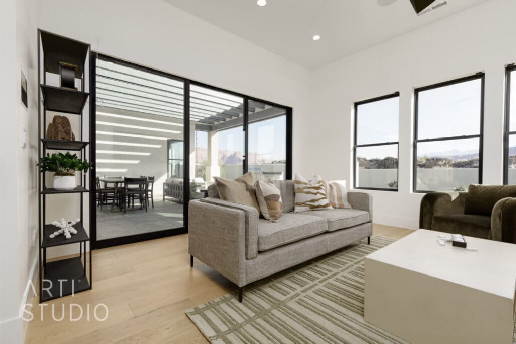 Bright, modern common area featuring stylish furniture, large windows, and inviting decor, enhancing a vibrant lifestyle.