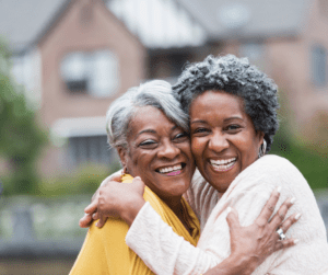 Two women hugging